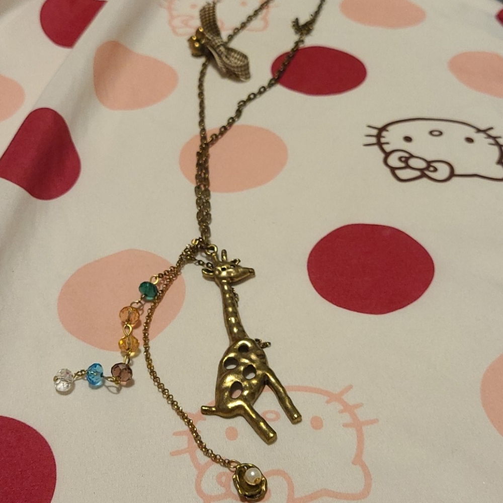 Long giraffe charm necklace